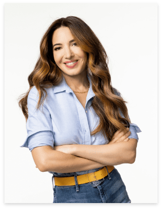 Marie Forleo standing against white background